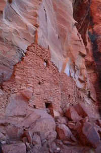 Stunning architecture of ancient red rock cliff dwellings in arizona.