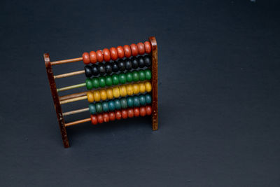 High angle view of multi colored pencils against black background