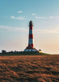 Westerheversand lighthouse on the north sea a landmark of the eiderstedt peninsula in germany.