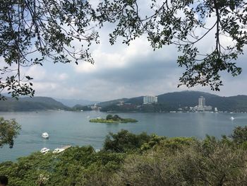 Scenic view of bay against sky