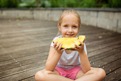 Midsection of woman holding food