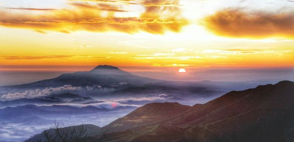 Scenic view of landscape at sunset