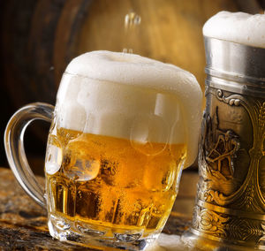 Close-up of beer glass on table