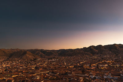 High angle view of townscape against sky during sunset