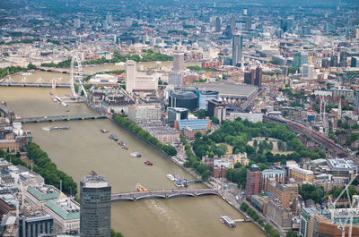 High angle view of buildings and river in city