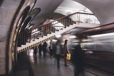 Blurred motion of train at subway station