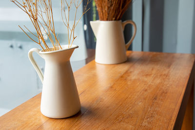 Close-up of vase on table at home