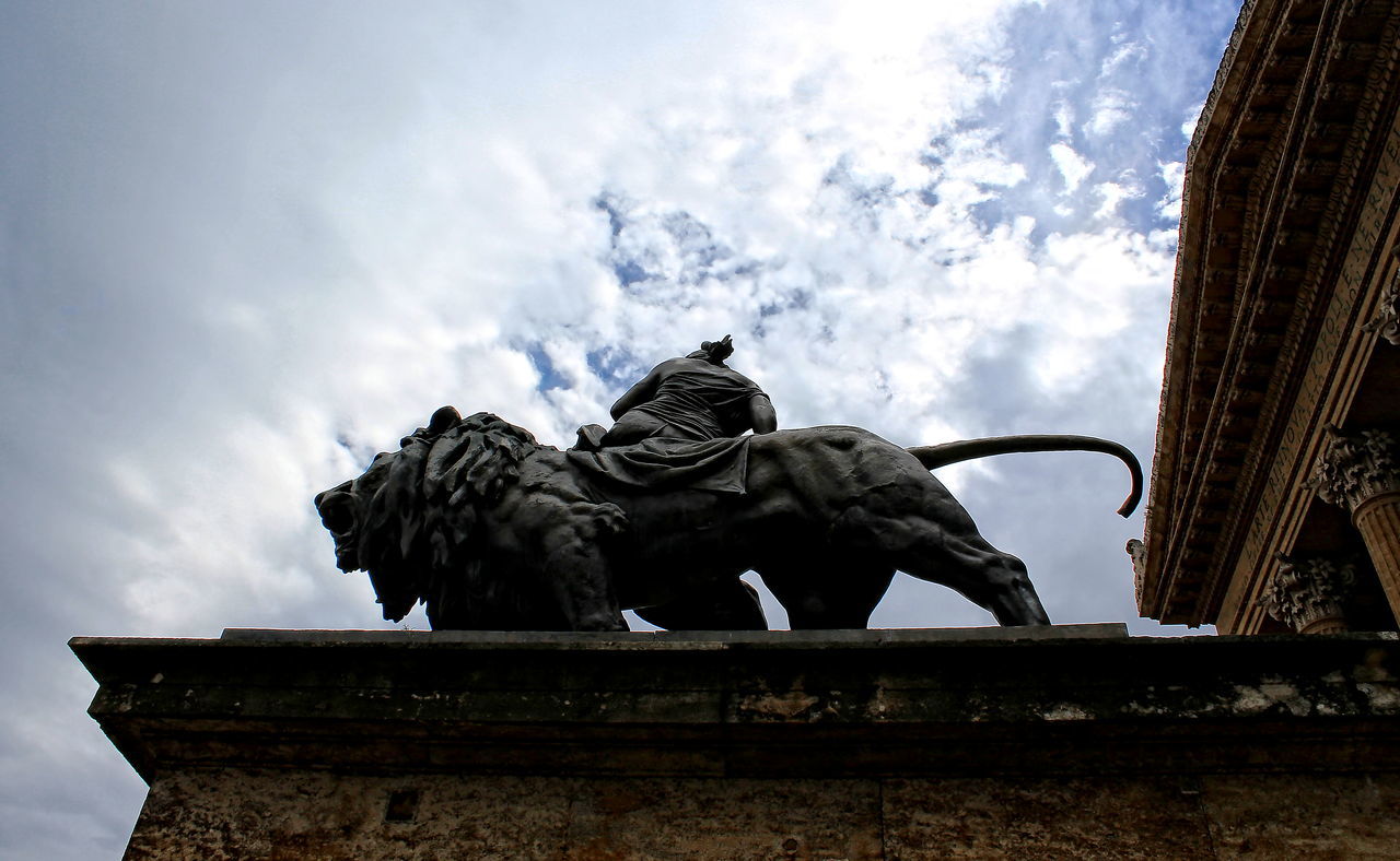 LOW ANGLE VIEW OF SCULPTURE