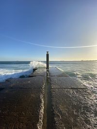 Scenic view of sea against clear sky