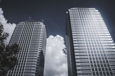 Low angle view of modern buildings against sky