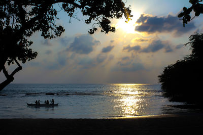 Scenic view of sea against sky at sunset