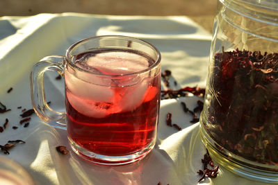 Close-up of drink in glass jar on table