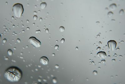 Full frame shot of wet glass window