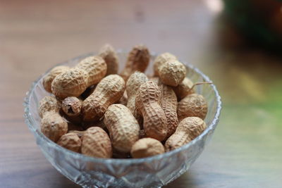 Close-up of wicker basket in bowl on table