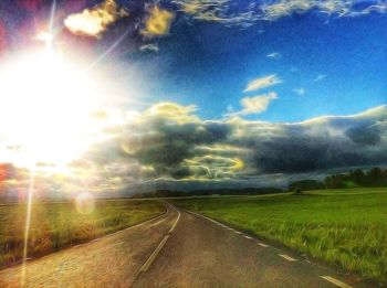 Road passing through field