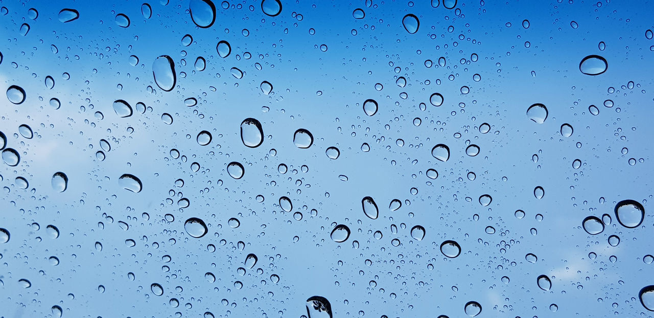 drop, water, wet, backgrounds, transparent, no people, window, full frame, nature, close-up, glass, rain, indoors, blue, pattern, sky, raindrop, purity, black and white, abstract, freshness, simplicity