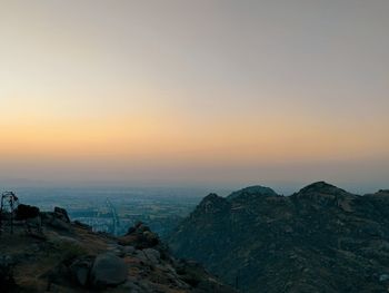 Scenic view of mountains against sky during sunset