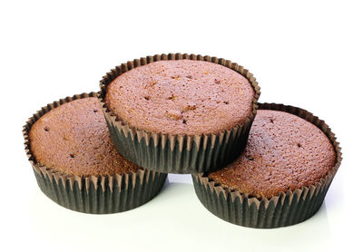 Close-up of chocolate cake against white background