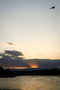 Scenic view of sea at sunset