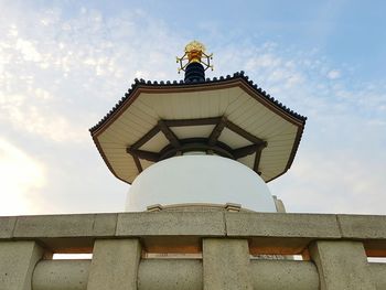 Low angle view of statue against sky