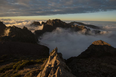 Misty mountains near pico ruivo, madeira at sunset
