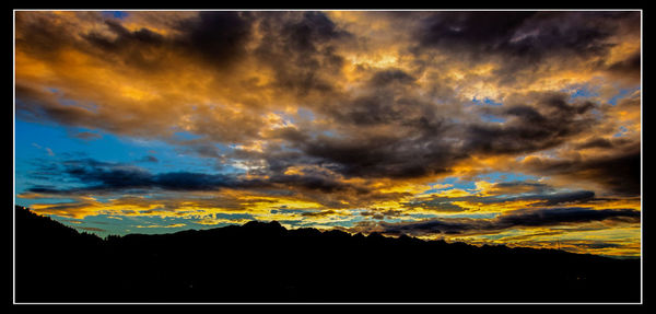 Low angle view of dramatic sky