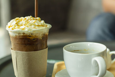 Close-up of coffee served on table