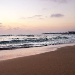 Scenic view of sea at sunset