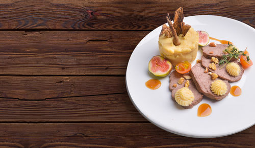 High angle view of breakfast served on table