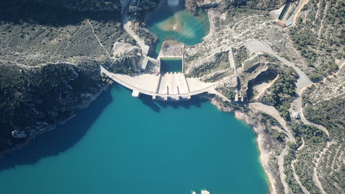 High angle view of sea by land