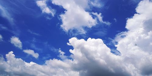 Low angle view of clouds in blue sky