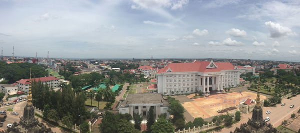 High angle view of buildings in city against sky