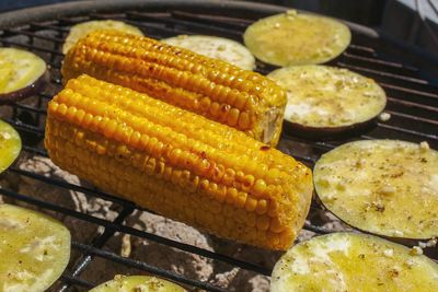 High angle view of meat on barbecue grill