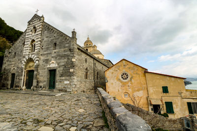 Low angle view of old building against sky