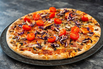 Close-up of pizza served in plate