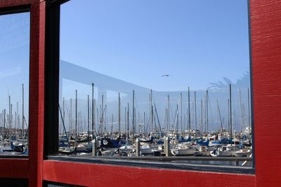 Panoramic view of harbor against clear blue sky