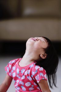 Close-up of a girl with eyes closed