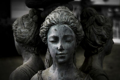 Close-up of old female sculptures