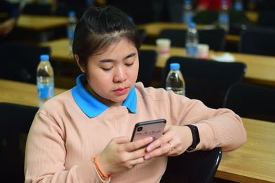 Young man using mobile phone