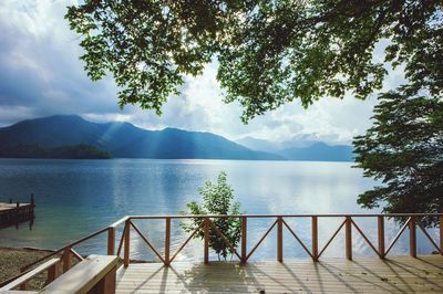 Scenic view of mountains against cloudy sky