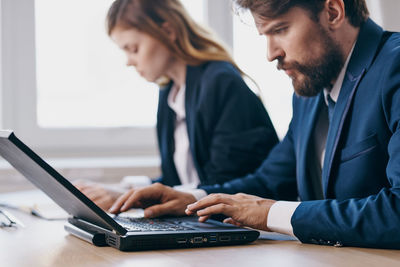 Business colleagues working at office