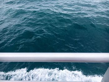 High angle view of railing against sea