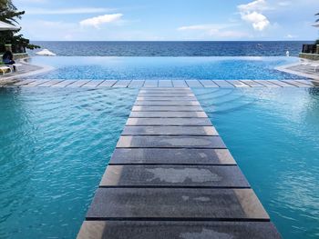 View of swimming pool against sea