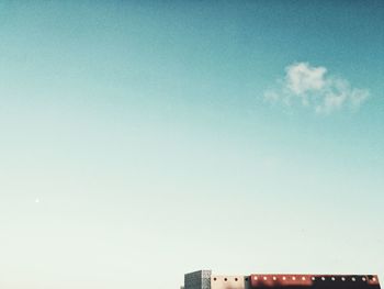 Low angle view of building against blue sky