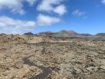 Scenic view of desert against sky