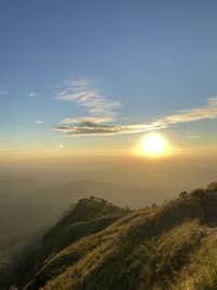 Scenic view of landscape against sky during sunset