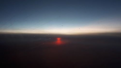 Scenic view of sea against sky at sunset