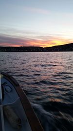 Scenic view of river at sunset