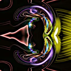 Close-up of light painting against black background
