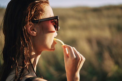 Portrait of mid adult man wearing sunglasses